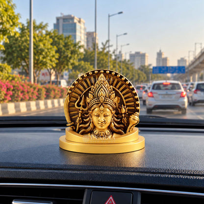 Durga Maa Idol placed on car dashboard for spiritual decoration