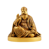 Front view of Guru Nanak Dev Ji statue showing detailed craftsmanship