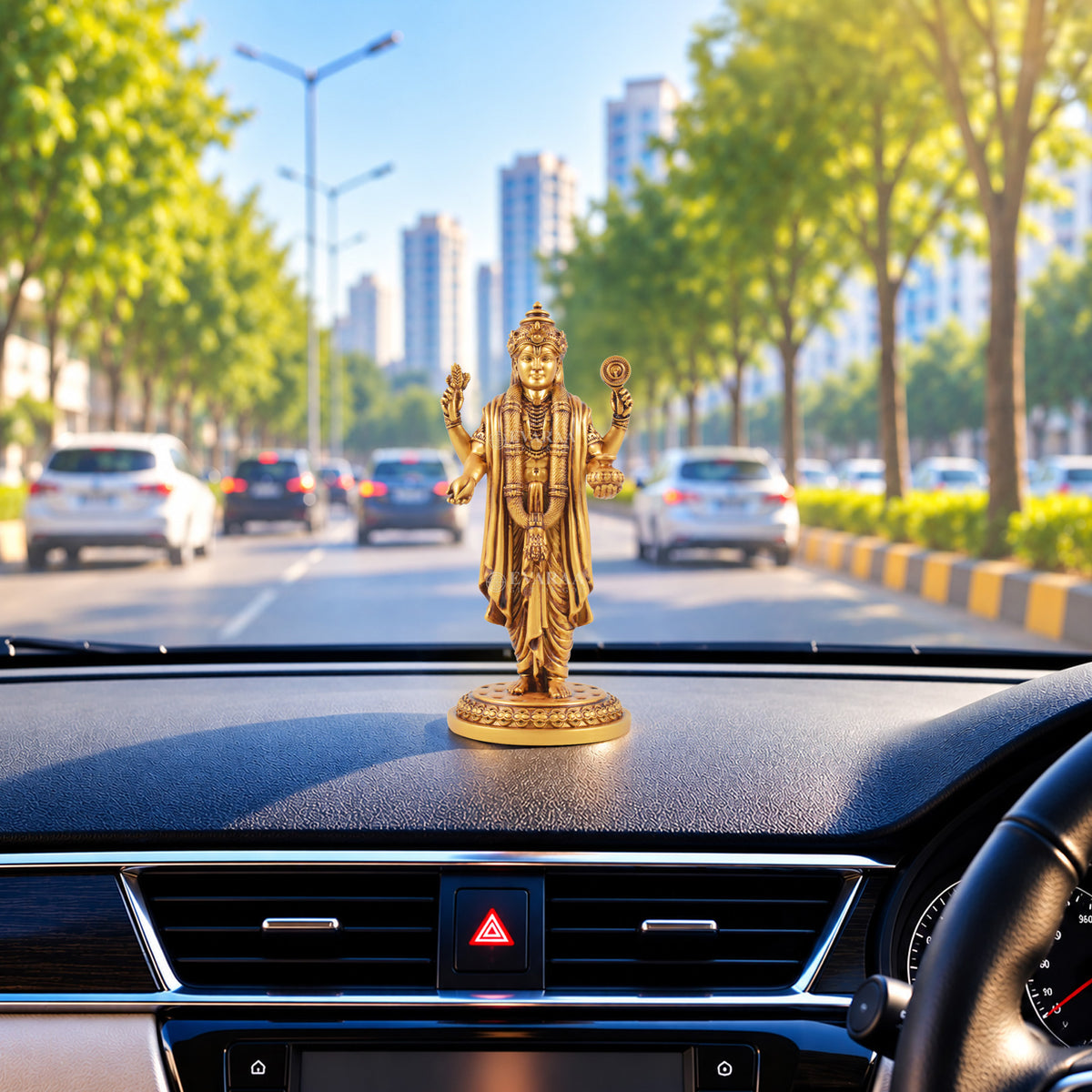 Lord Dhanvantari idol displayed on a car dashboard