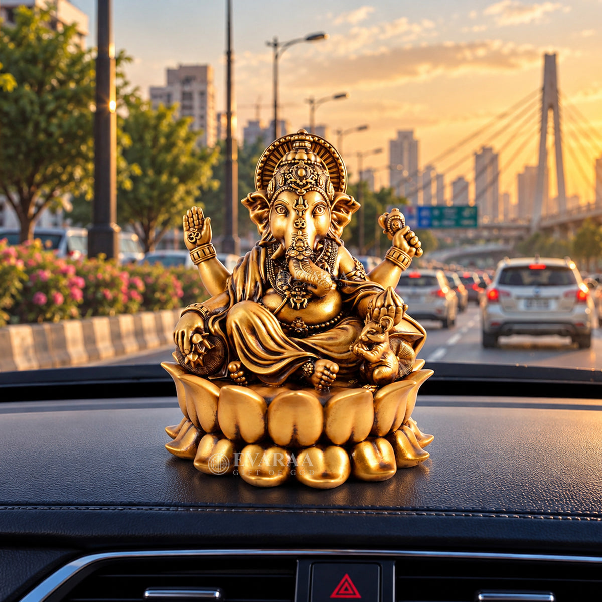 Lotus Ganesha Idol placed on car dashboard for decoration