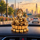 Lotus Ganesha Idol placed on car dashboard for decoration