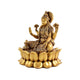 Lotus Laxmi Idol displayed in a decorated spiritual home temple setup