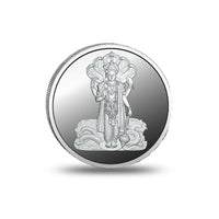 Close-up of the Lord Vishnu design engraved on a silver coin